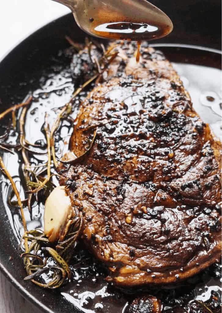 Ribeyes with Garlic Rosemary Butter
