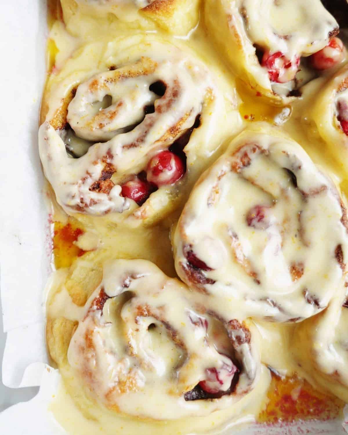 Close up of the iced cinnamon and cranberry rolls ready to serve.